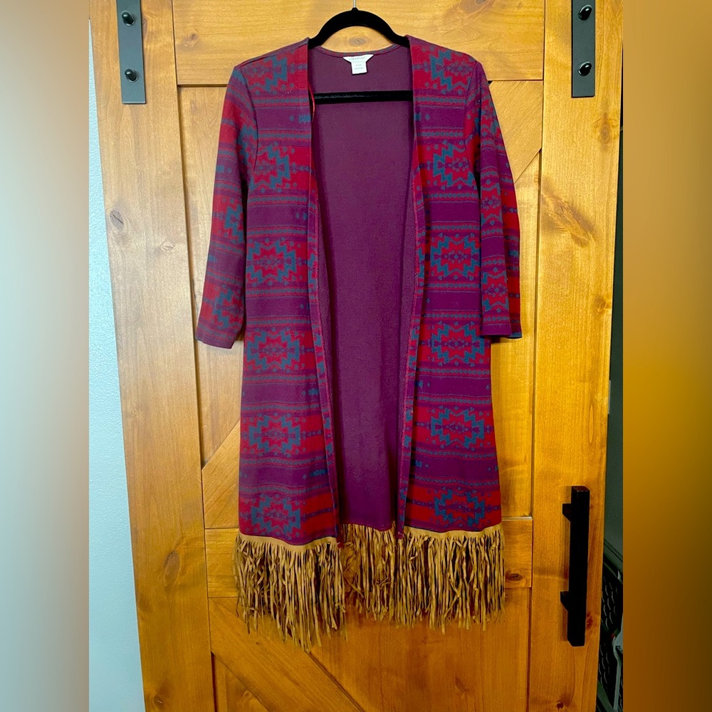 Ariat cardigan with fringe at bottom.